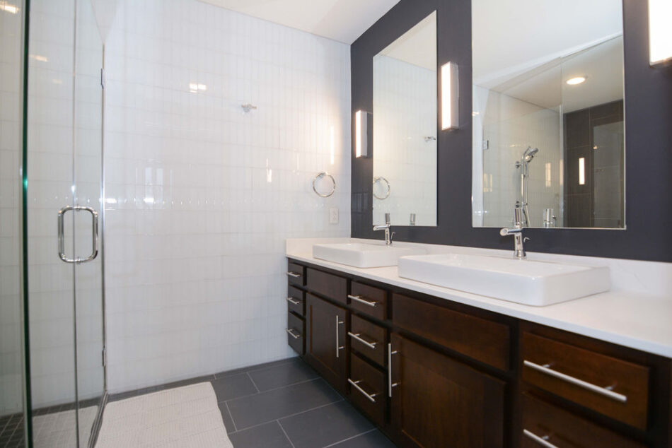 Bathroom with double sink and double mirrors.