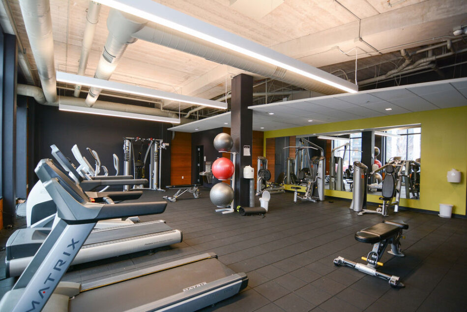 Treadmills in exercise room in condo.