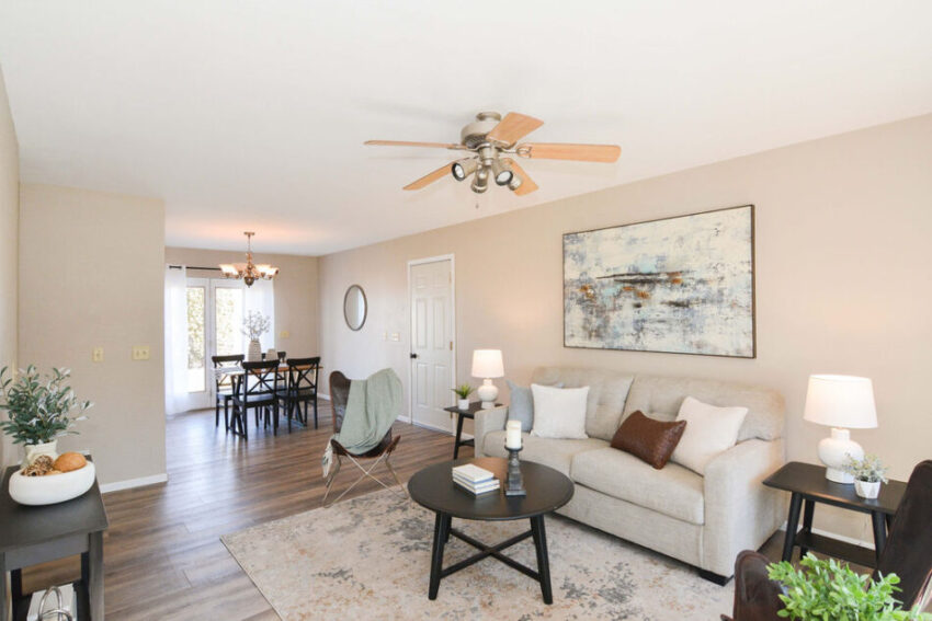 Living room with dining area beyound.