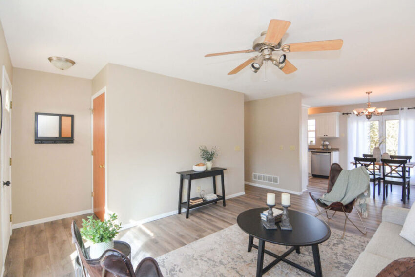 Living room just beyond front door entrance.
