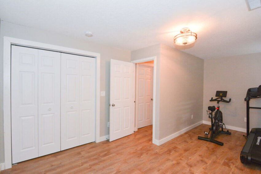 Exercise space with LPV floors and large closet.