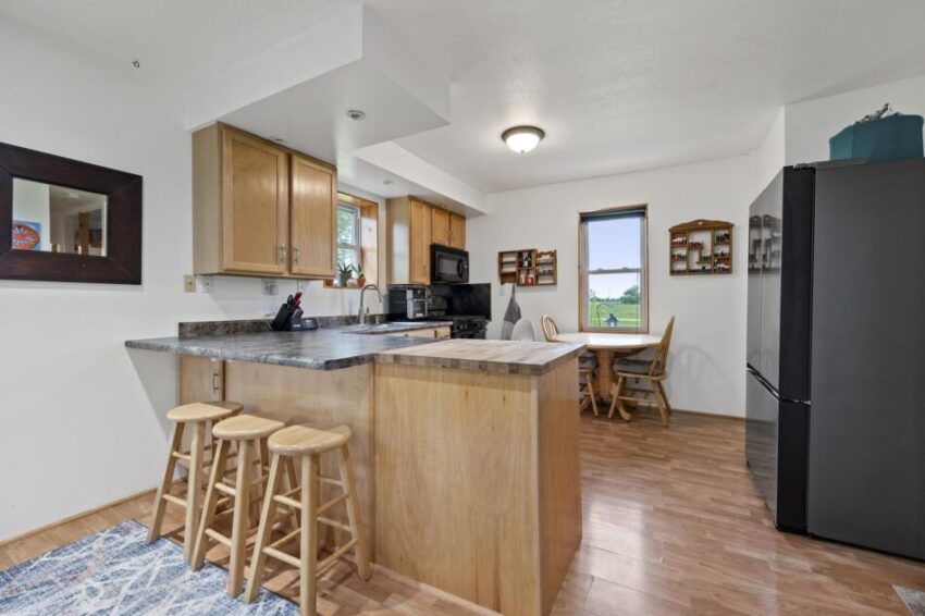 Kitchen with seating at counter.