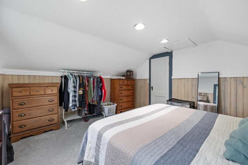 Bedroom with sloped ceilings.