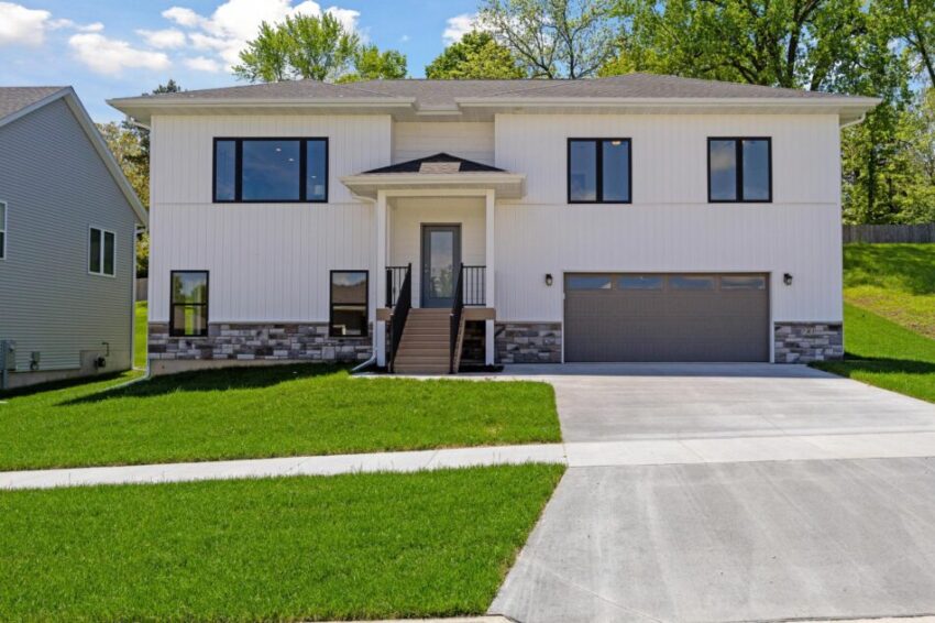 Modern farmhouse two story home with two-car garage.