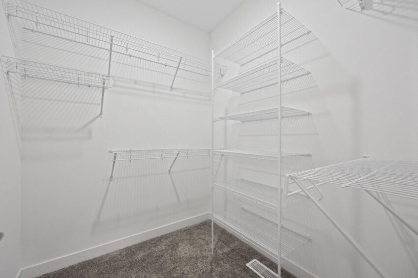 Closet with wire storage shelves.