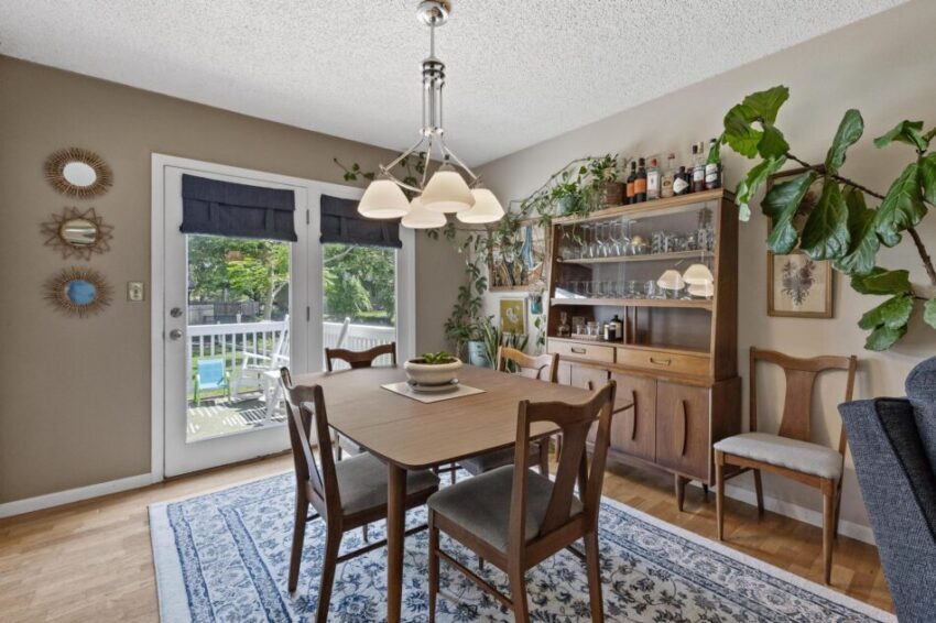Dining room with doors to patio.