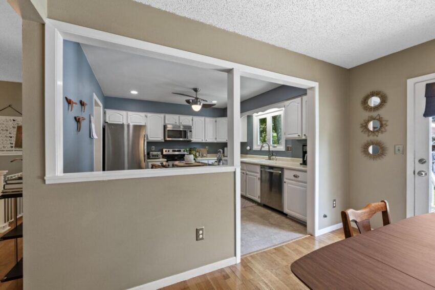 Adorable kitchen with pass-through.