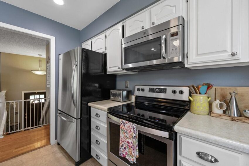 Kitchen with nice white cabinets.