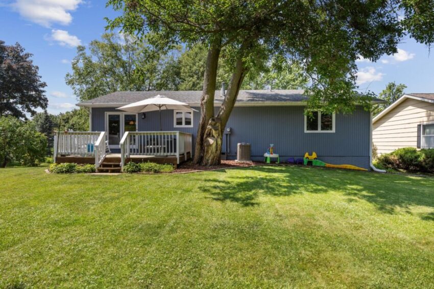 Blue house exterior from the back.