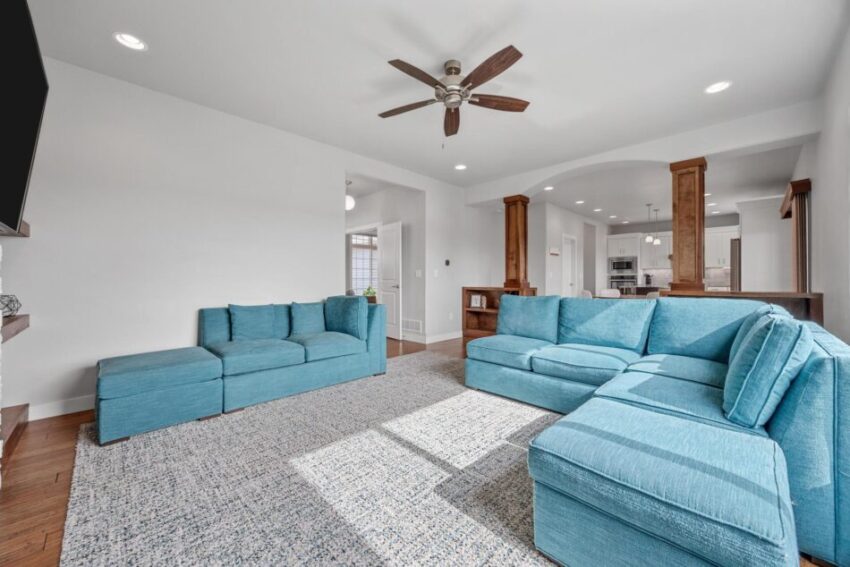 Living room with large windows and custom would work.