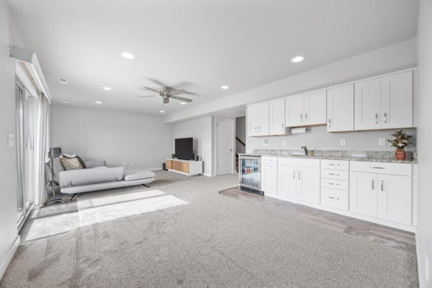 Lower level with exit to backyard.