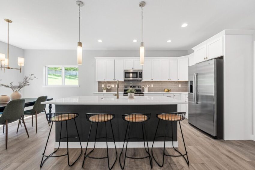 Kitchen with two pendant lights above island.
