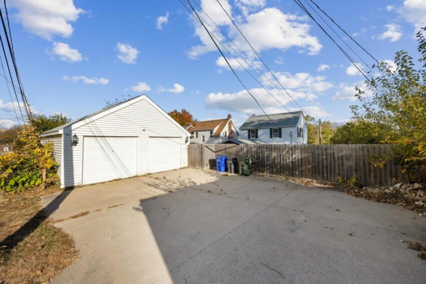 Detached garage with two sets of double doors.